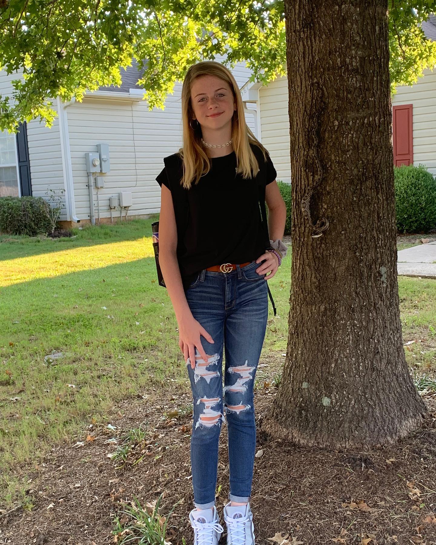 A mother took this photo of her daughter in the backyard and uploaded it to Facebook. But when she looked closer at the picture, she was terrified and froze. Here’s what they noticed in the picture: – Check the comments