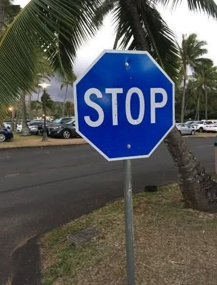 The meaning behind a blue stop sign.