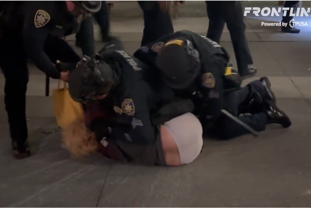 New Angle Shows Police Dragging Protester After Fight Breaks Out at TPUSA Event