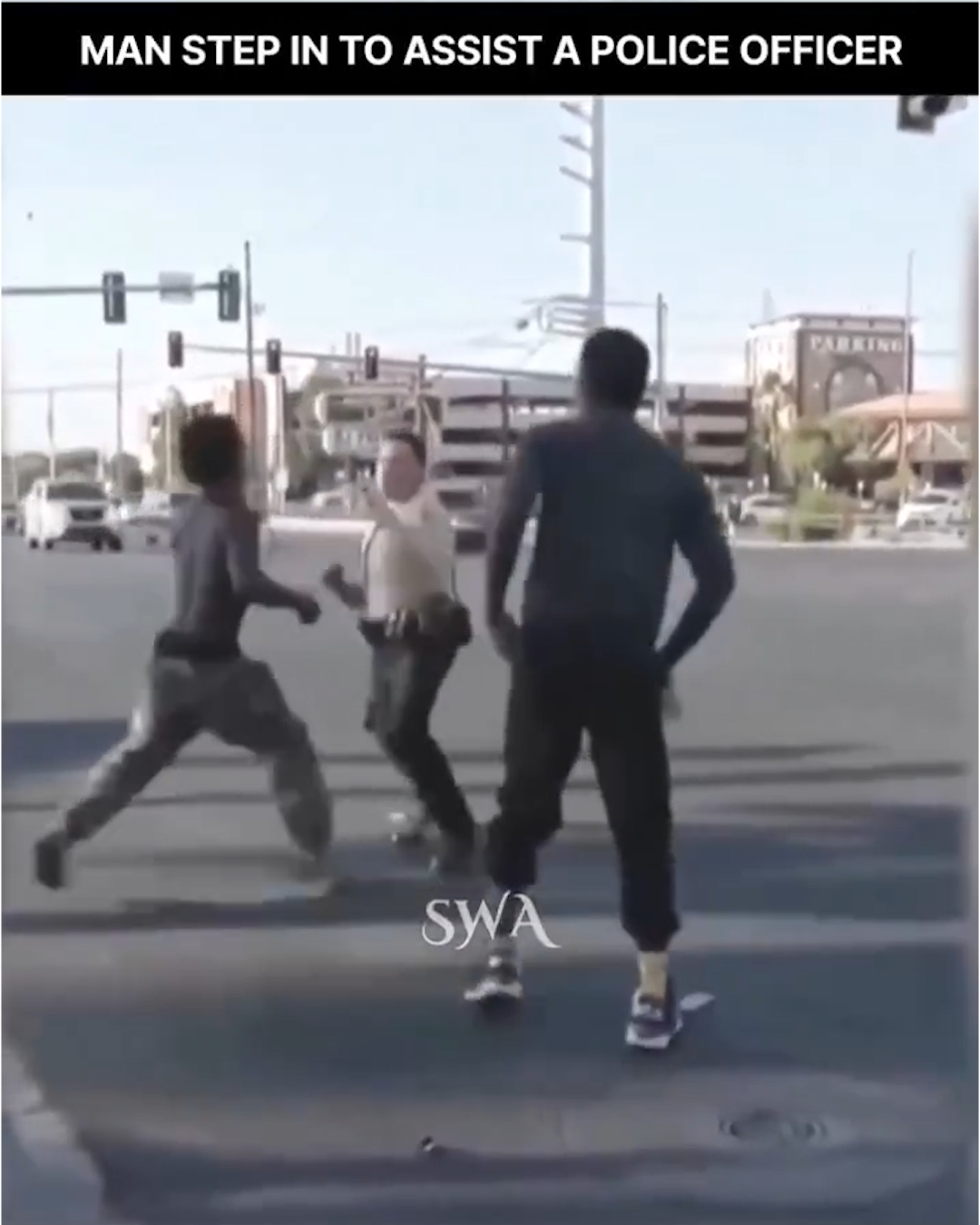 Police Officer Fights Off Two Men Resisting Arrest — Until Good Samaritans Step In to Help